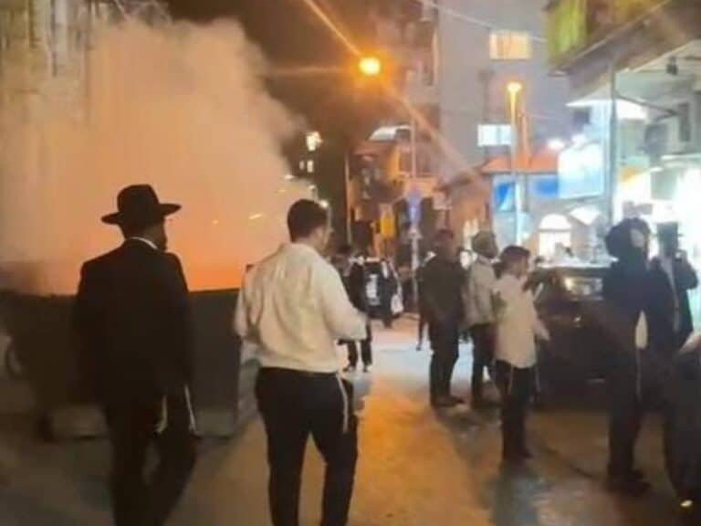 Burning garbage bins and clashes with police in central Jerusalem during an ultra-Orthodox protest against the military draft law. Photo: Israel Police Spokesperson he