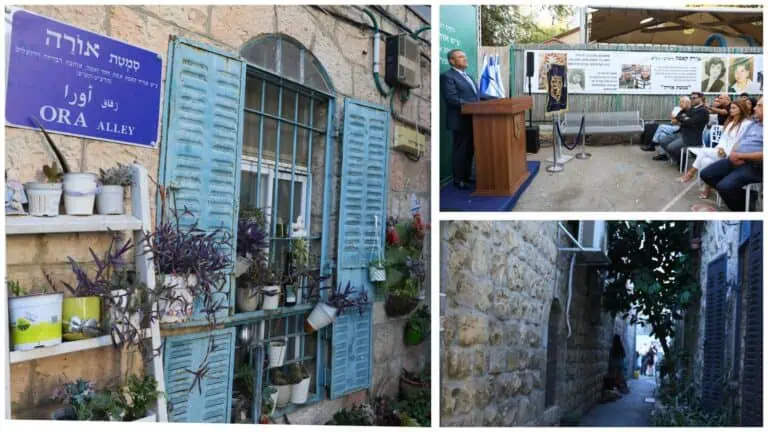 Lorong lama yang dipulihkan di Baitulmaqdis dengan dinding batu dan tingkap biru